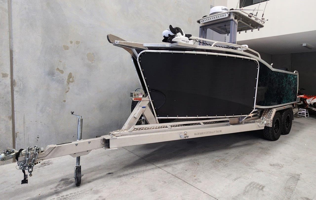 2023 Black Marlin 5.8 Centre Consol with off road trailer